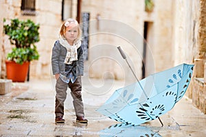 Little girl on rainy day