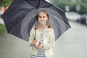 Little girl in rainy day