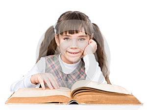 Little girl reading big book. isolated on white background