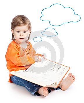 Little girl reading a book