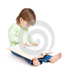 Little girl reading a book