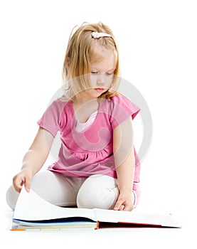 Little girl reading book on floor isolated