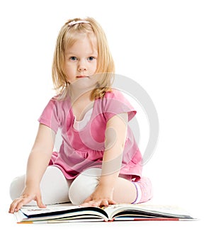 Little girl reading book on floor isolated