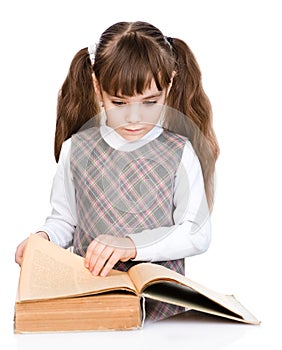 Little girl reading book. isolated on white background