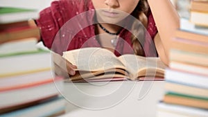 Little girl reading her book - closeup