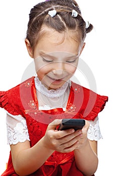 Little girl reading sms on cell