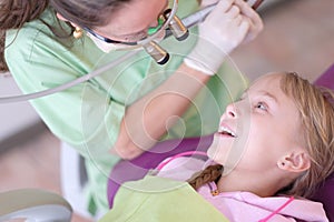 Little girl on reception with a dentist