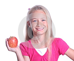 Little girl with red apple on white