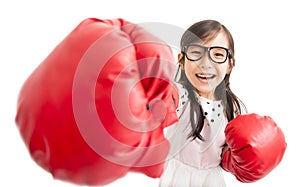 little girl with red boxing gloves