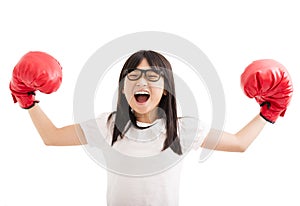 little girl with red boxing gloves