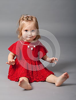 Little girl in red clothes