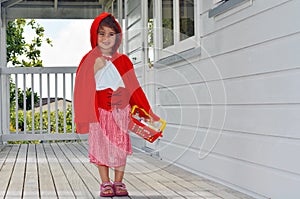 Little girl with Red Riding Hood costume