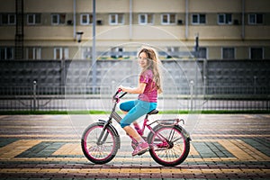 Little girl riding bicycle