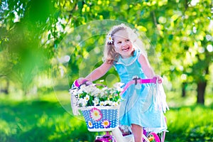 Little girl riding a bike