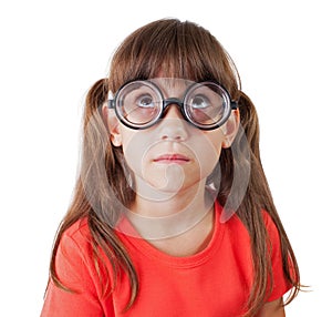 Little girl in round glasses