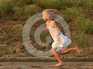 Little girl running outdoor