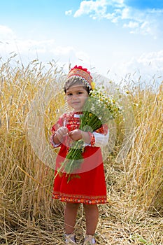 Little girl in the Russian national sundress