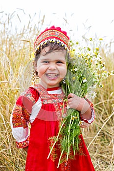 Little girl in the Russian national sundress