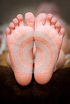 A little girl's bare feet