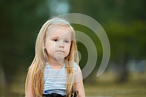 Sadness. Thoughtfulness. Little girl. Portrait child. Blonde photo