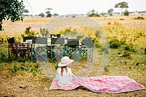 Little girl on safari bush lunch