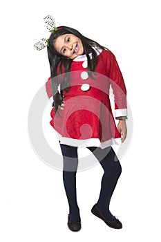 Little girl in Santa Claus costume and Reindeer antlers