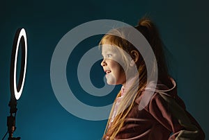 Little girl in search of an image