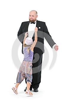 Little Girl and Servant in Tuxedo Have Fun