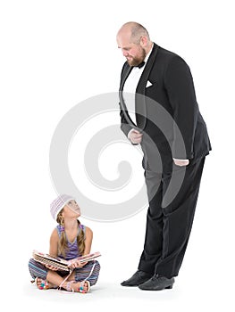 Little Girl and Servant in Tuxedo Looking at Each Other