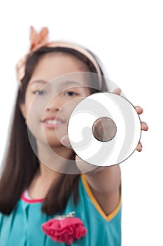 Little girl showing CD