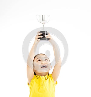 Little girl showing the trophy