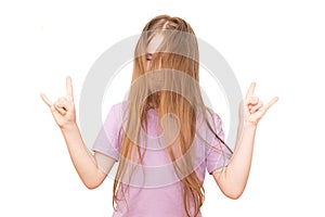 Little girl shows a rocker goat. Isolated on a white background.