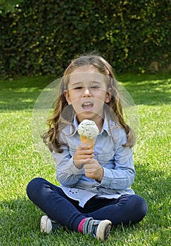 Little Girl Singing with A Ice Cream Microphone