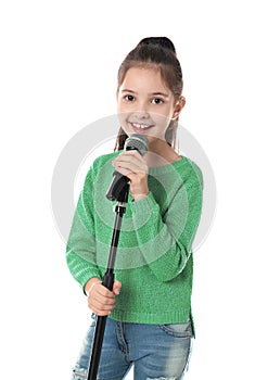 Little girl singing into microphone