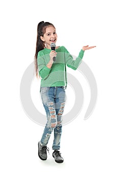 Little girl singing into microphone