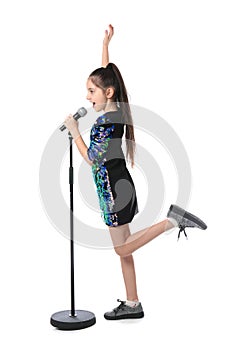 Little girl singing into microphone