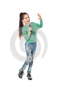 Little girl singing into microphone