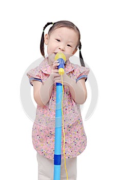 Little girl singing with microphone