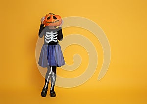 Little girl in skeleton costume