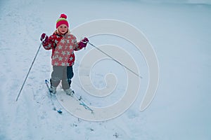 Little girl ski in winter nature, kids active lifestyle, winter sport