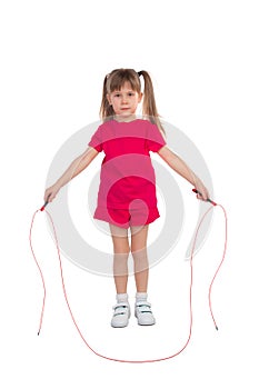 Little girl with a skipping rope