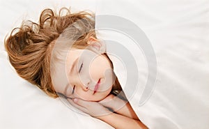 Little girl sleep in the bed