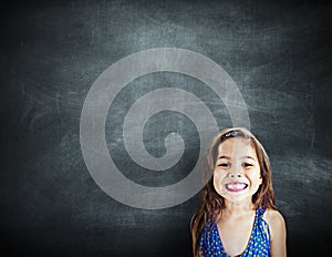 Little Girl Smiling Happiness Copy Space Blackboard Concept