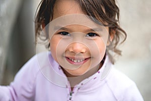 Little girl smilling at camera