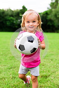 Little Girl With Soccer Football Ball