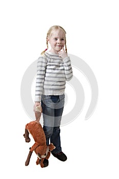 Little girl with soft toy in hand