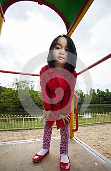 A little girl spending her free time on the playground