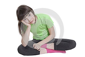 The little girl squatting crosslegged