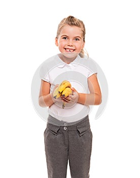 Little girl standing against white backdrop with three fresh ban