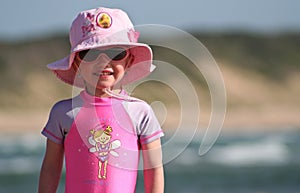 Little Girl standing on the beach